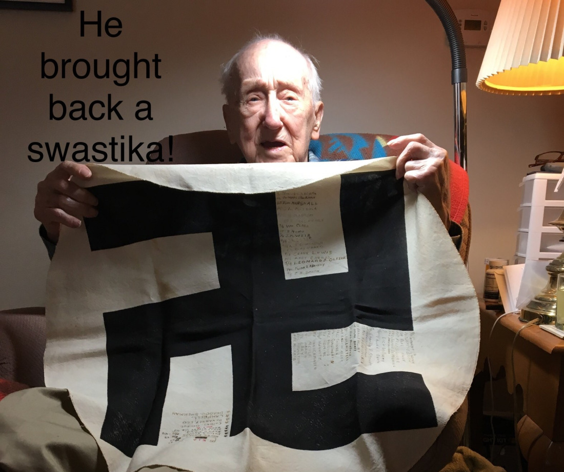 Lundy with the swastika flag he brought back from Germany